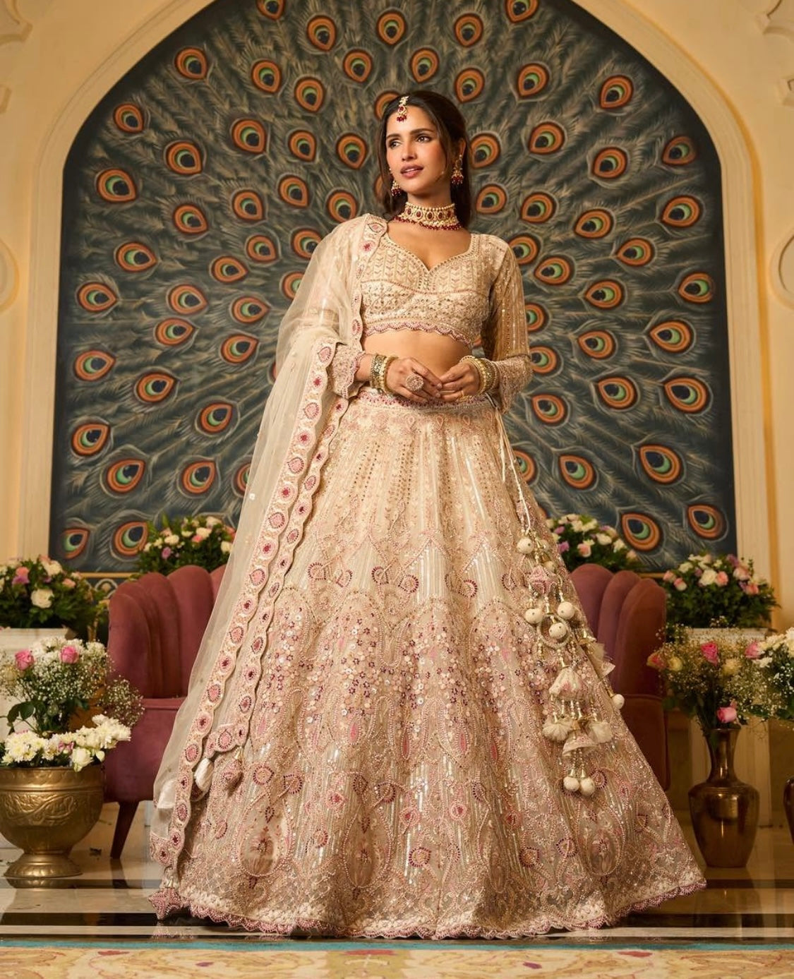 Gold color lehenga with multicolored thread work