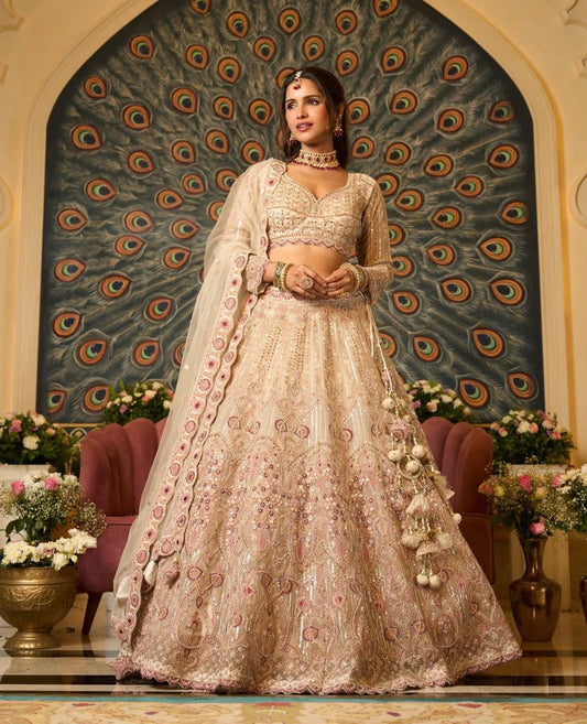 Gold color lehenga with multicolored thread work