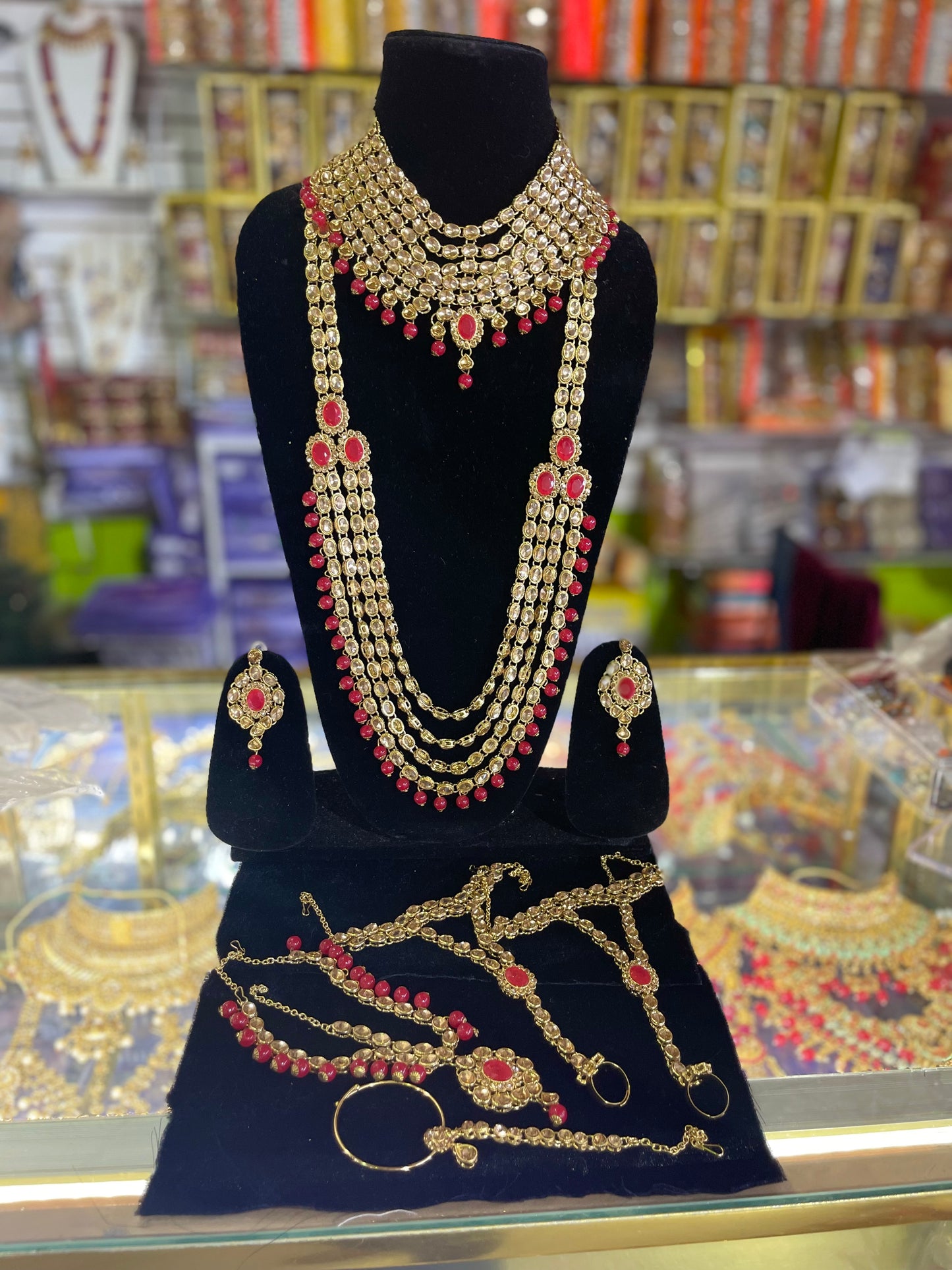 Red & Gold stone studded Kundun Bridal set