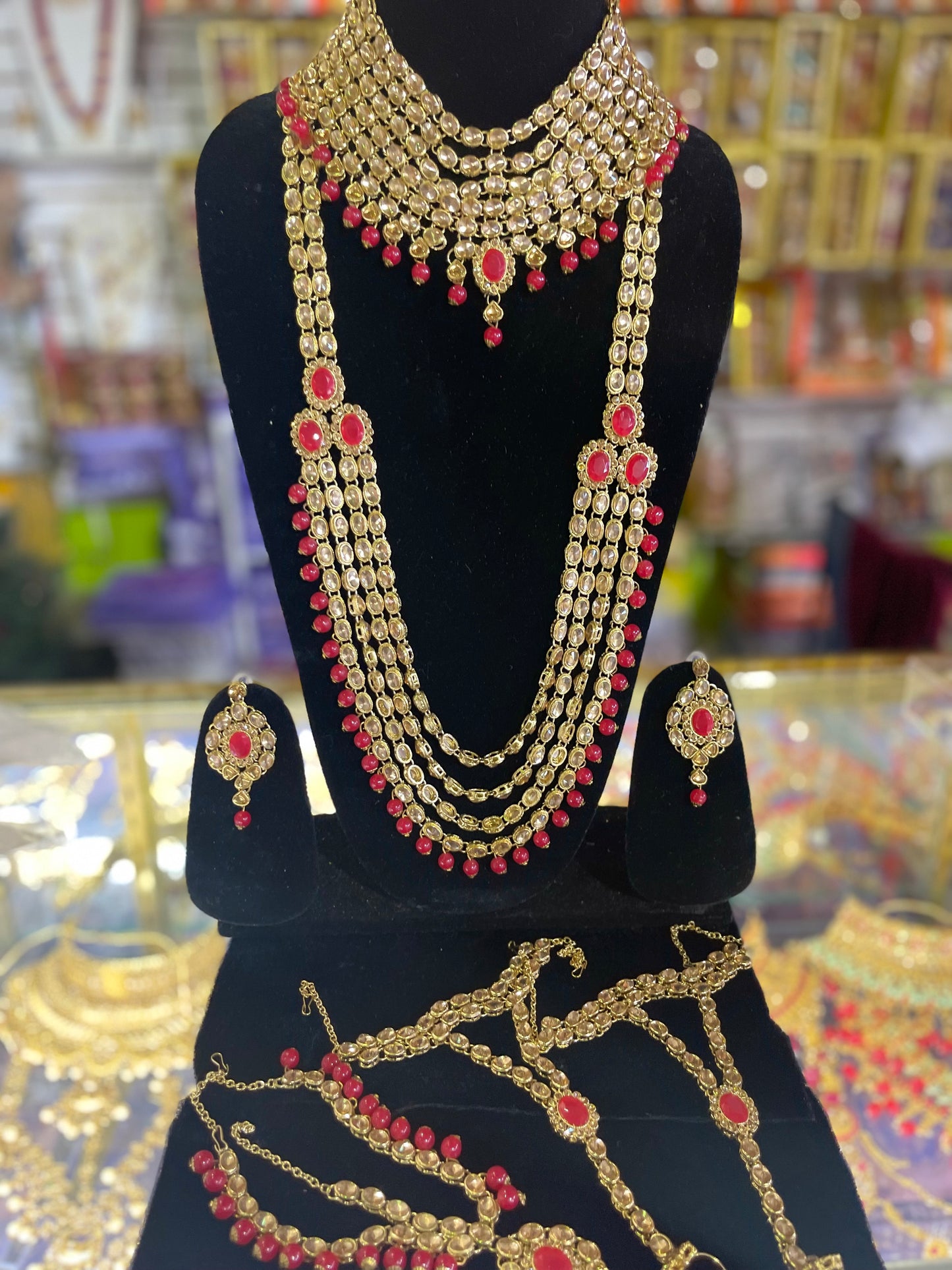 Red & Gold stone studded Kundun Bridal set