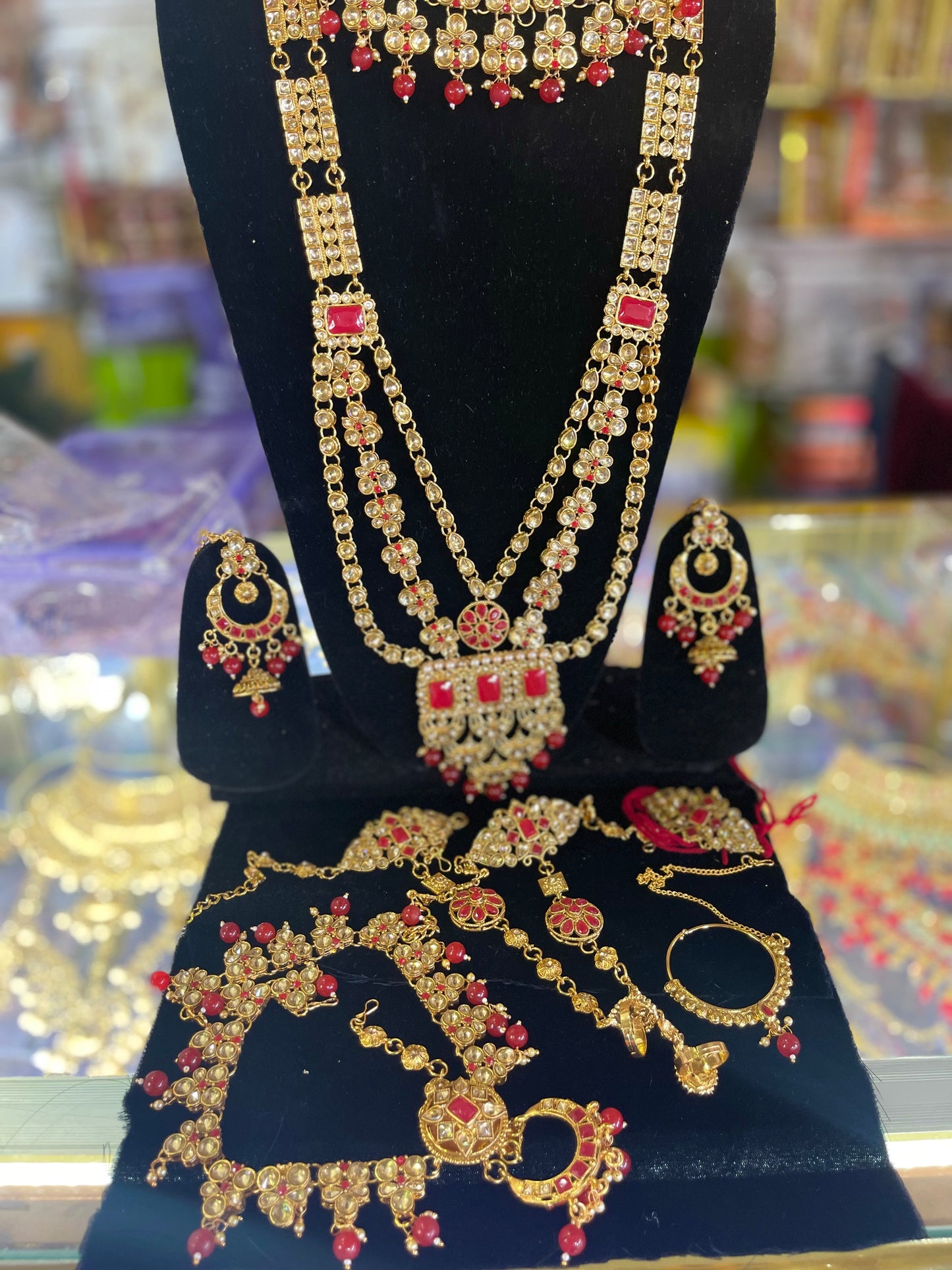 stone studded Kundan Red & Gold  Bridal set