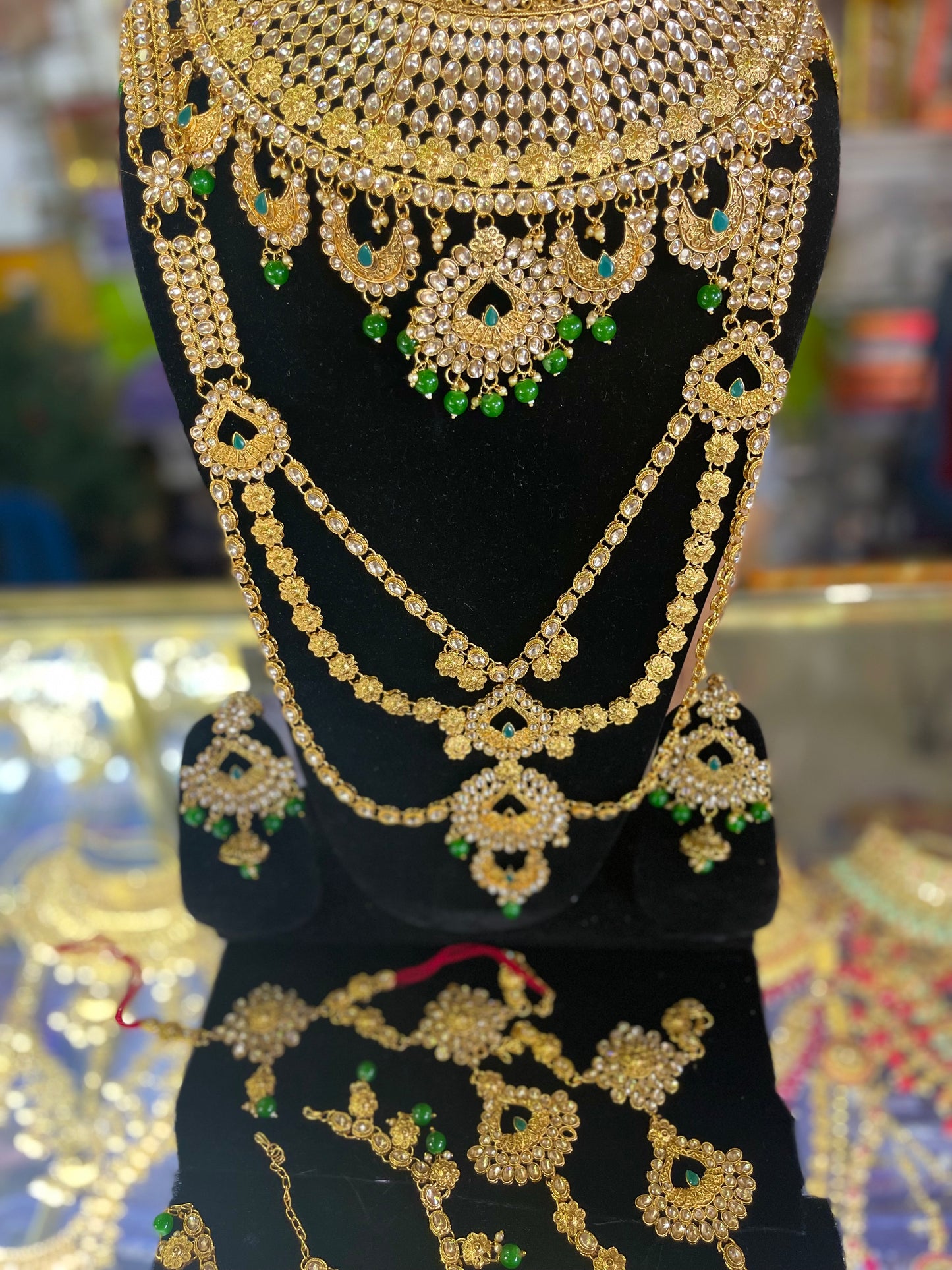 stone studded Kundan Green & Gold  Bridal set