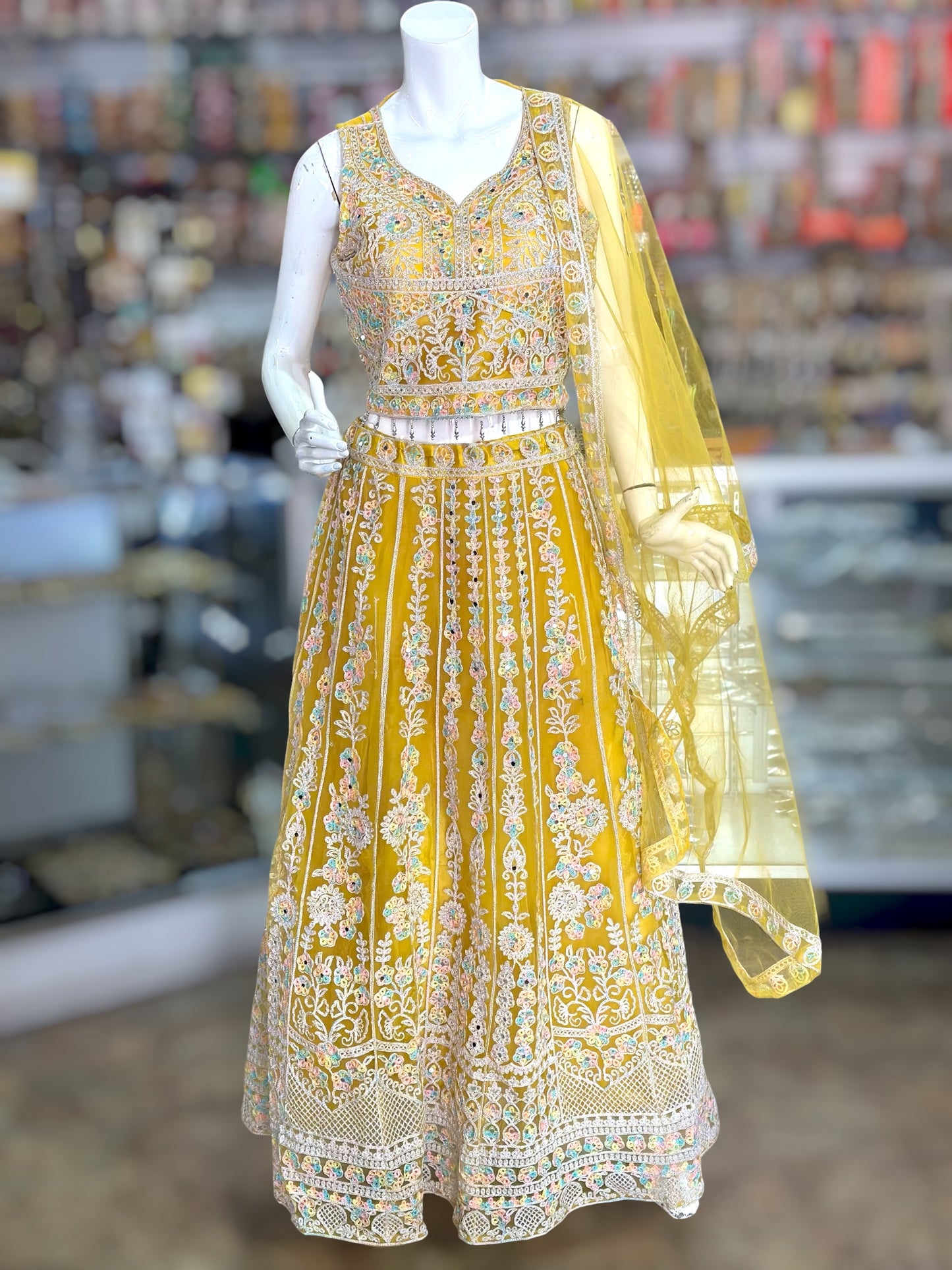 Yellow  color lehenga with gold thread work