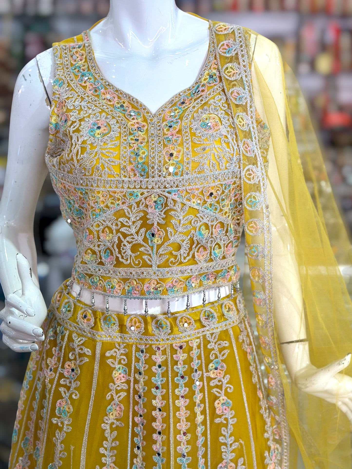 Yellow  color lehenga with gold thread work